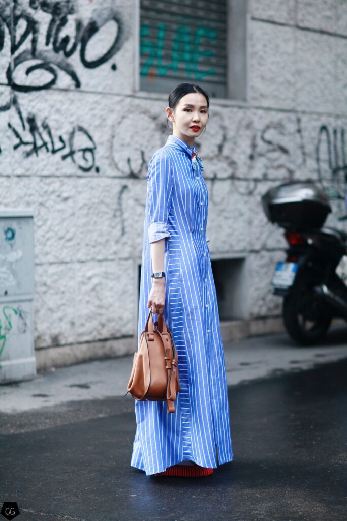 como usar chemise no dia a dia, o que é chemise, diferença entre camisa e chemise, em que ocasião usar chemise, significado de chemise, chemise como vestido, chemise no trabalho, chemise street style, chemise feminina tendência, look com chemise aberta, chemise com cinto, chemise listrada, chemise minimalista, chemise elegante, peça versátil moda