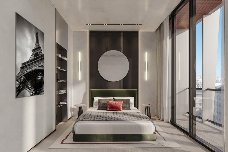 Render de suíte do Karl Lagerfeld Residences Lisboa com painel escuro na cabeceira, almofada vermelha e janelas do piso ao teto